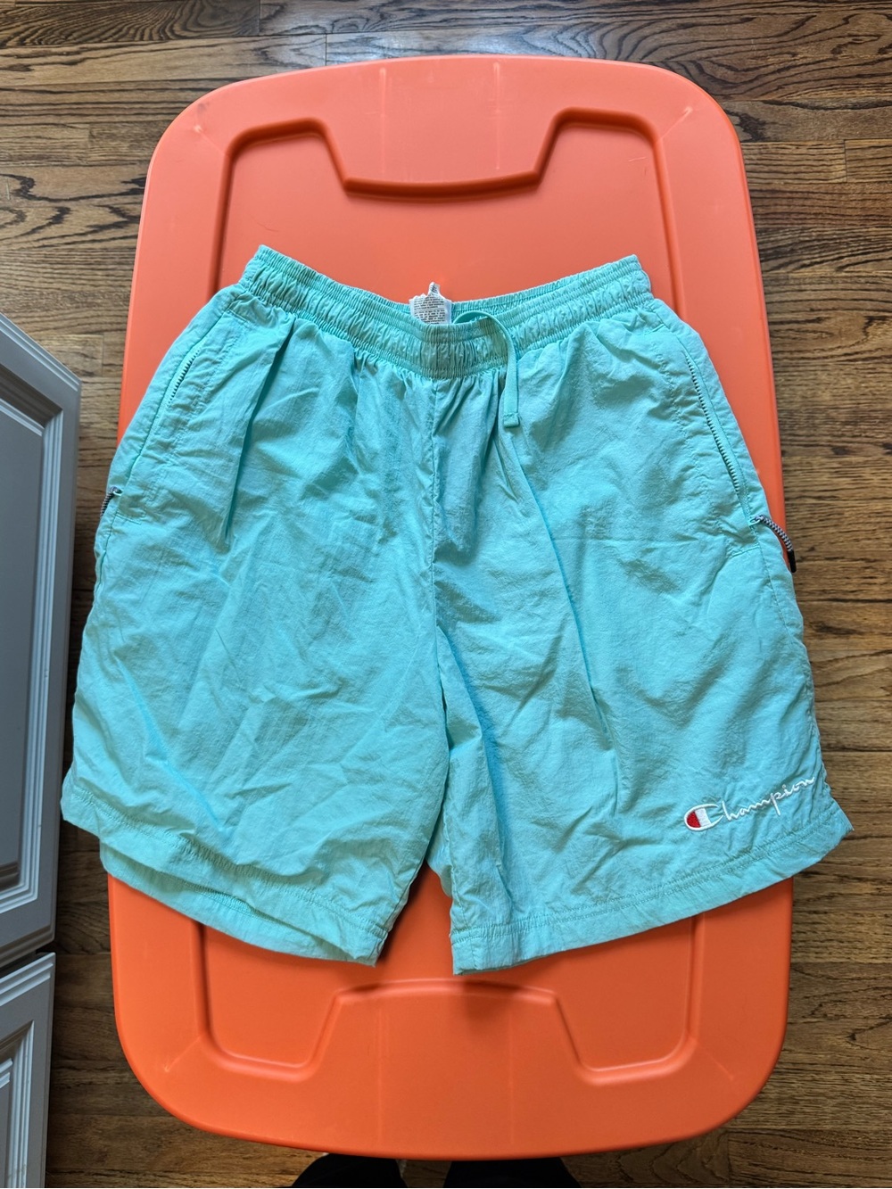 Champion: Light Aqua/ blue men swim trunks, size medium
